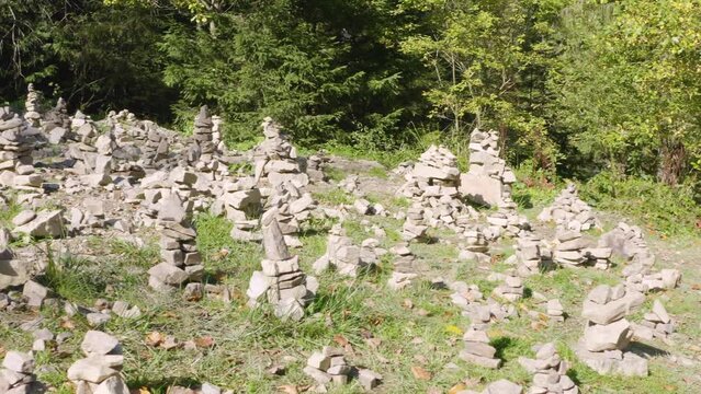 pyramid in memory of a trip  land art near Synevyr lake in the Carpathians, Ukraine. Stone hills of the pyramid in memory of a trip to a famous place.