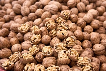 Large group of wallnut fruit background. High quality photo