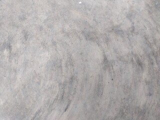 The cement concrete floor has a uniquely beautiful pattern that can be used as a beautifully designed background.