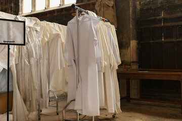 Chasubles of the priest in a Catholic church - obrazy, fototapety, plakaty