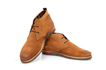 Male brown leather boots on white background, isolated product.