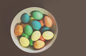 Fototapeta na wymiar Colored and Dyed Easter Eggs in a bowl