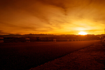 sunset over the road