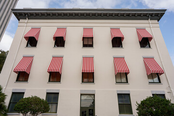Red and white striped awnings at the Florida State Capitol Building
