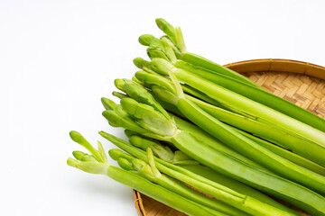 Limnocharis flava in bamboo weave plate on white background.