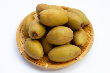 Fresh sapodilla fruit on white background