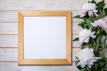  Square wooden picture frame mockup with pale pink peony