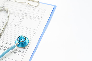 病院　予約と受付　問診票　水色の聴診器