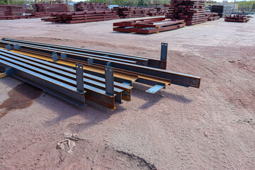 Some components for a prefabricated metal building are steel columns, rafters, jambs, panels, and...
