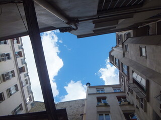looking up the Paris sky, between the buildings, 2013