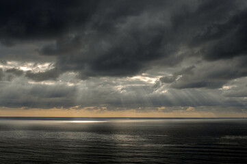 The Suns rays come through the clouds after a storm off the cost of California