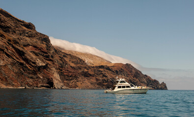 Fototapeta na wymiar Large sportfishing boat anchored off the northern end of Guadalupe island Baja Mexico