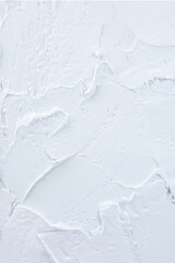White textured surface using spackling paste background.