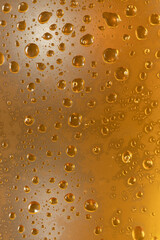 Close up of little drops of water in a beer glass cup. Selective focus.