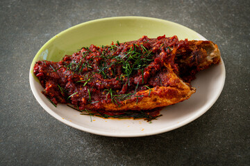 Deep–fried fish and chili sauce