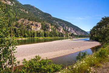 Mountains and river landscape. Location place is Flathead River in the Glacier National Park,...