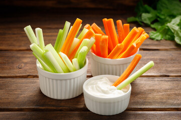Fresh vegetables - chopped celery sticks and carrots. Diet and healthy food.