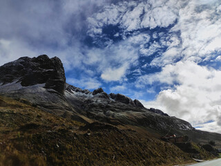 Picturesque view of rocky highlands under blue sky