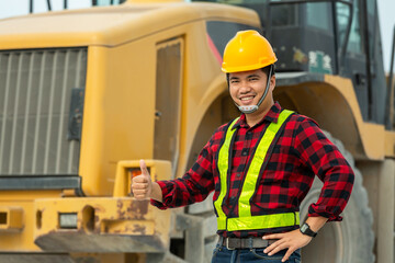 asian driver wear safety uniform backhoe excavator and bulldozer on construction site