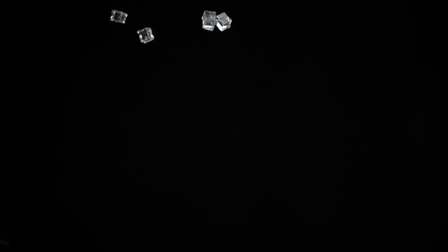Ice Cubes launched upwards with a black background.