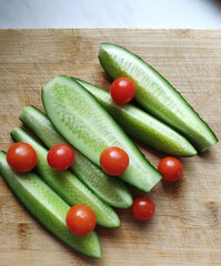 Cucumbers and tomatoes. Fresh vegetables. Vegetable still life.