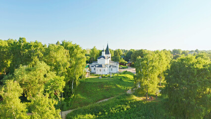 Naklejka premium Church of the Resurrection of Christ, Tarusa, Beautiful summer aerial shots of the Oka river, forests, rivers and fields Russia