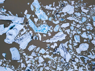 Beautiful Aerial view of the massive Glacier in Iceland and its lagoon caused by global warming -Svinafellsjokull - Jökulsárlón