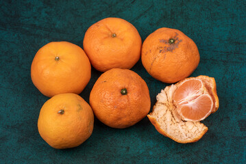 Whole or partial oranges in dark light