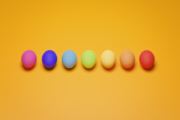 Pattern from rainbow chicken eggs on yellow background top view. Creative food minimalistic background. Preparation for easter. Magic natural food. Eggs painted with rainbow colors.