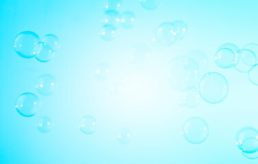 Fototapeta na wymiar Beautiful Transparent Blue Soap Bubbles Texture on a White Background. 