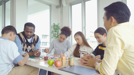 A group of multi ethnic of students kids and teachers study, learn art painting, drawing in school. Education in classroom. People lifestyle