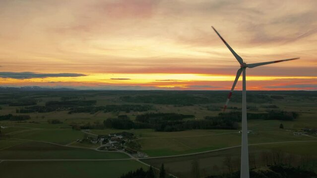 Cinemagraph of modern wind turbine with rotor located in rural environment by the Alps in the district Ebersberg in Bavaria. The 10h rule prevents the construction of renewable and sustainable energy