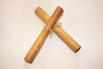 Old rolled paper parchment with string two rope