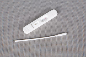 PCR antigen test to COVID-19 coronavirus swab collection kit in close-up