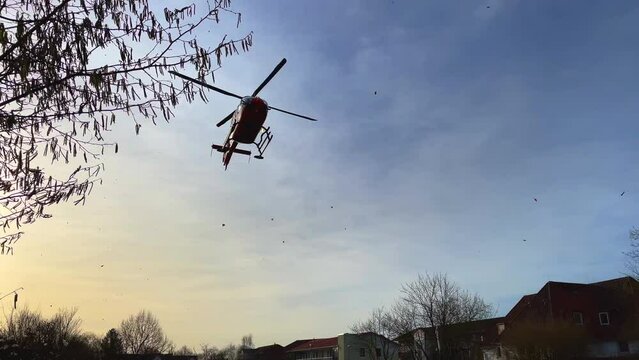 a rescue helicopter is just taking off into the air