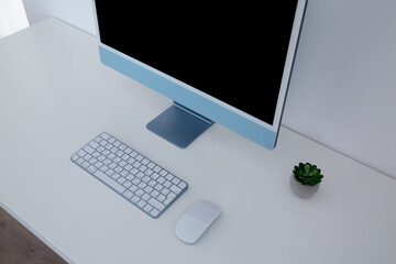 Desktop computer with wireless keyboard and mouse. New model multicolored Apple iMac