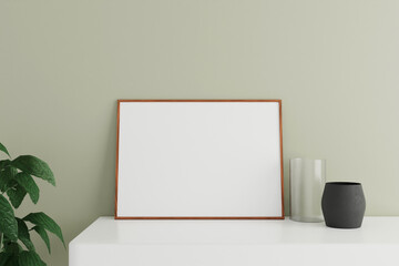 Minimalist and clean horizontal wooden poster or photo frame mockup on the white table leaning against the room wall with vase and plant