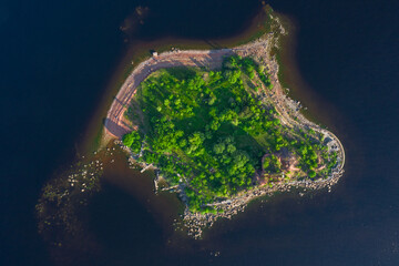 View from the height of the fort Emperor Paul 1 in Kronstadt, the Gulf of Finland, the island of forts, a ruined red brick building in the Gulf of Finland.