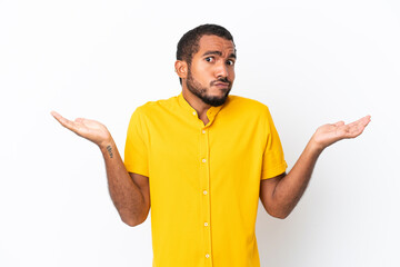 Young Ecuadorian man isolated on white background making doubts gesture