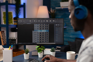 Professional engineer developer working remote from home at building prototype on computer...