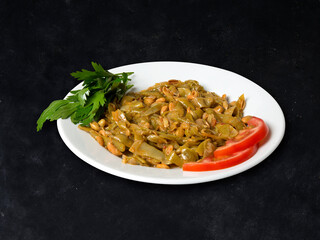 Turkish traditional Fresh Beans food on white plate