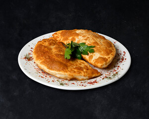 Turkish meat pie fried in oil ( Cig borek ) ( Raw pie or Tatar pie )