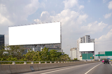 Large horizontal blank sign on a highway in Bangkok, Thailand.