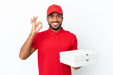 pizza delivery man picking up pizza boxes isolated on white background showing ok sign with fingers