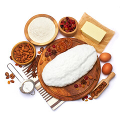 Traditional Christmas stollen cake with recipe ingredients isolated on white background