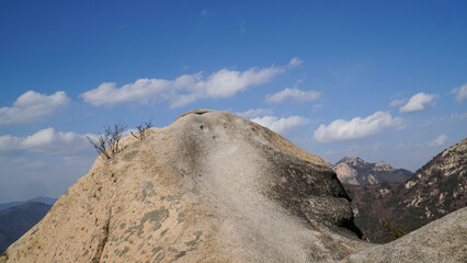 Rocks and clouds in the sky.
