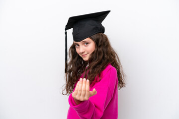 Little student girl wearing a graduated hat isolated on pink background inviting to come with hand. Happy that you came