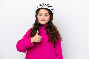 Little cyclist girl isolated on white background with thumbs up because something good has happened