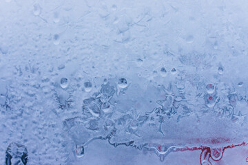 Winter natural background with frozen glass and beautiful unique texture