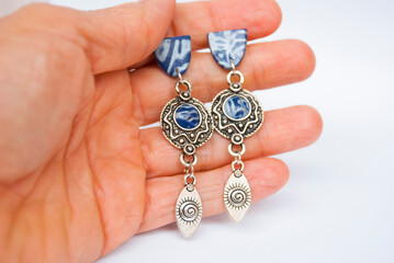 Long boho style silver blue earrings.